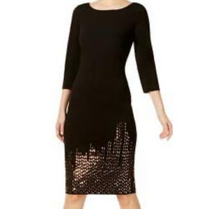 Black stealth dress by Calvin Klein.